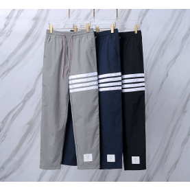 THOM BROWNE 톰브라운 042 사선 테크니컬 나일론 트랙 팬츠
