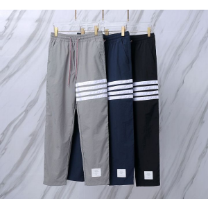 THOM BROWNE 톰브라운 042 사선 테크니컬 나일론 트랙 팬츠